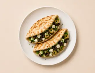 Греческая пита с оливками, сыром и зеленью